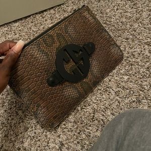 Snake skin clutch